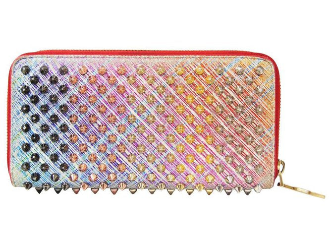 Used CHRISTIAN LOUBOUTIN
Panettone unicorn suede spikes wallet