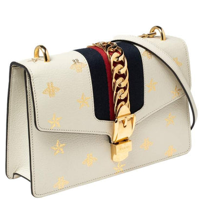 Used Gucci
Gucci White Bee Star Print Leather Small Sylvie Web Chain Shoulder Bag