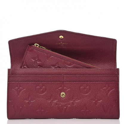 Used LOUIS VUITTON 
Empreinte Curieuse Wallet Aurore