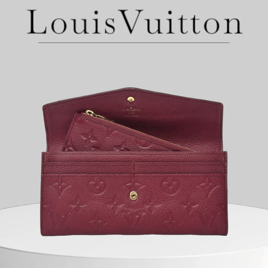 Used LOUIS VUITTON 
Empreinte Curieuse Wallet Aurore