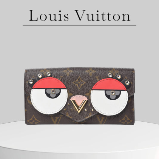 Pre-owned excellent condition A+ LOUIS VUITTON 
Monogram Sarah Birds Wallet