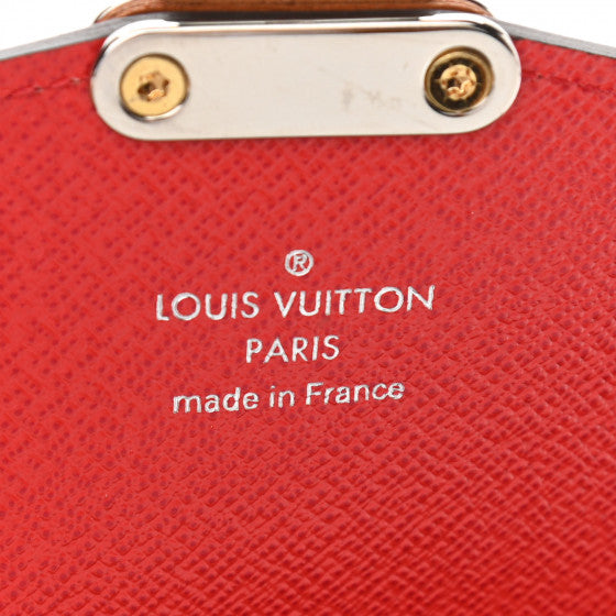 Used LOUIS VUITTON 
Monogram Tribal Mask Chain Wallet Rouge