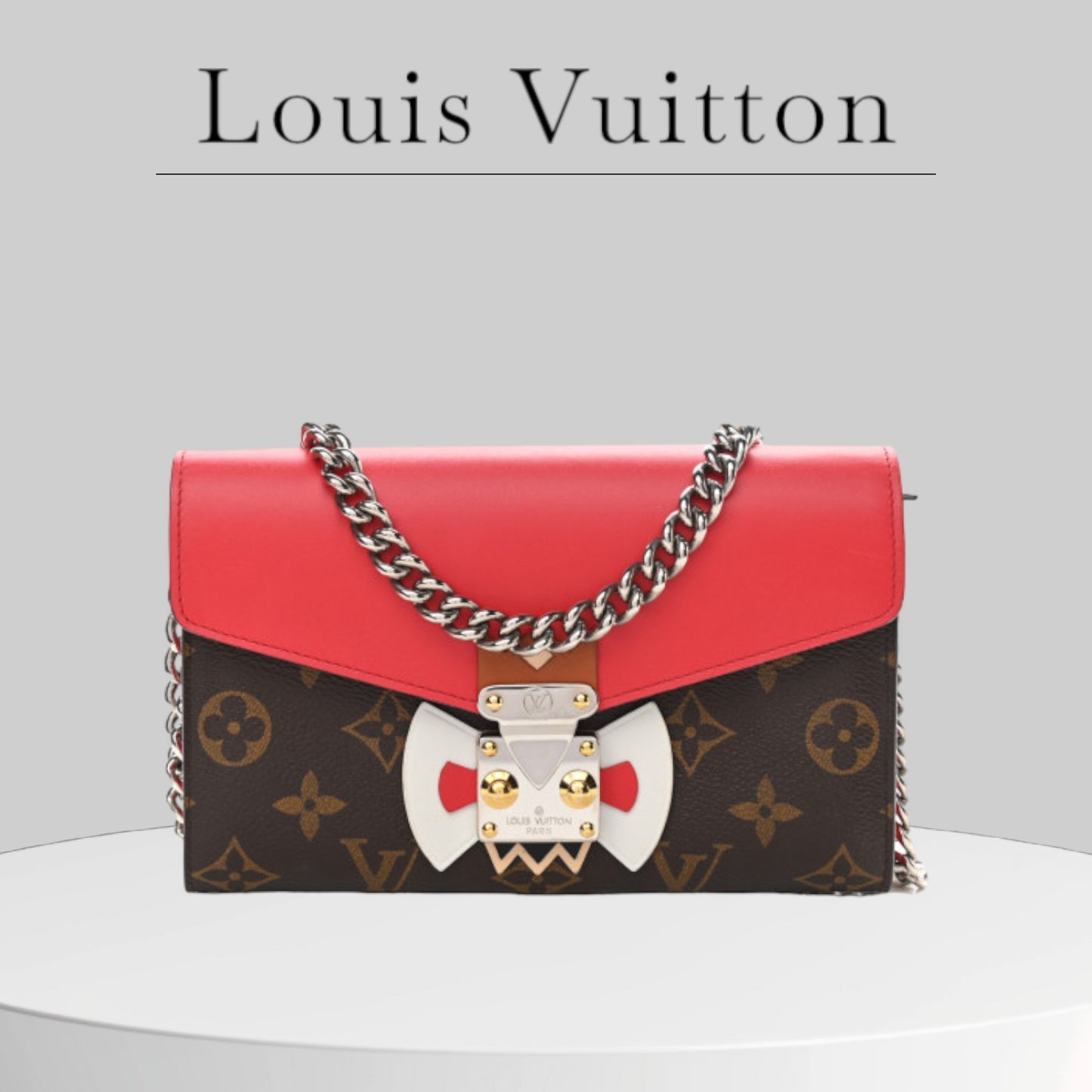 Used LOUIS VUITTON 
Monogram Tribal Mask Chain Wallet Rouge