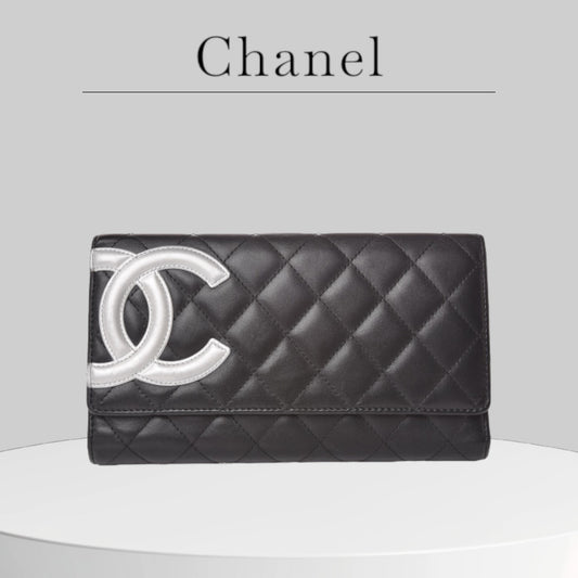 Used CHANEL 
Calfskin Quilted Cambon Flap Wallet Black White