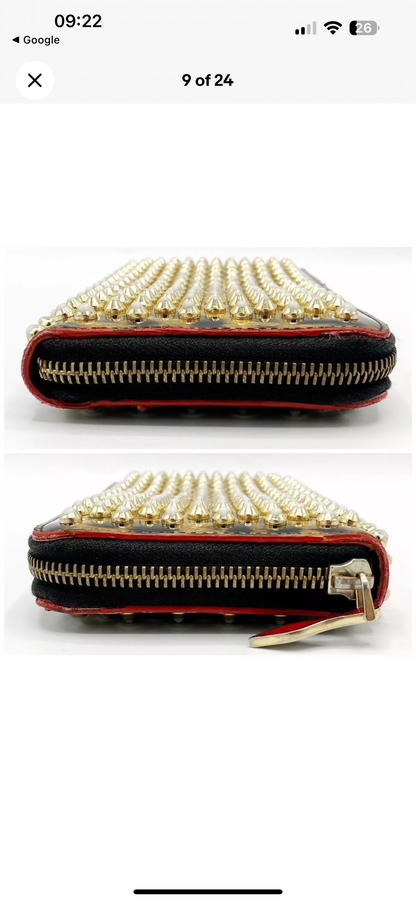 Used CHRISTIAN LOUBOUTIN 
Calfskin Panettone Spiked Zip Around Wallet Leopard