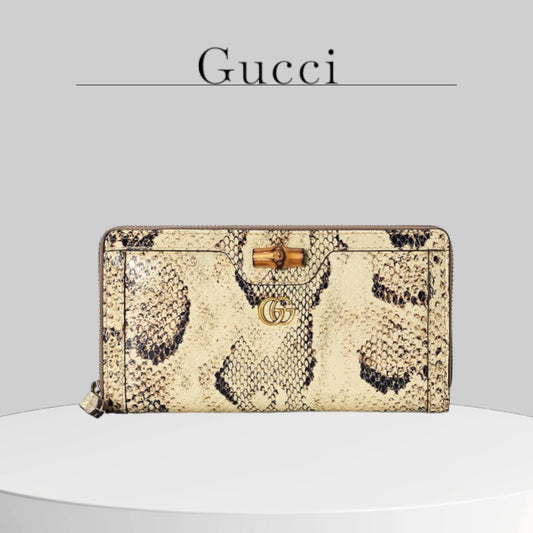 Used excellent condition A+ GUCCI 
Snakeskin Ostrich Diana Continental Wallet Butter Ivory Paradise Cloud Natural Gold