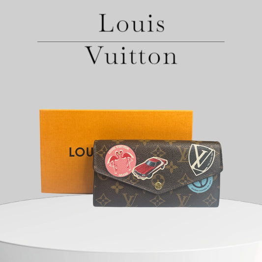 Pre-loved Louis Vuitton Sarah Limited Edition World Tour Monogram Canvas Wallet